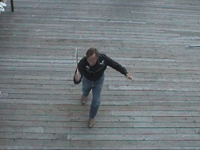 Frame 3 of the knife throwing sequence, as observed from above